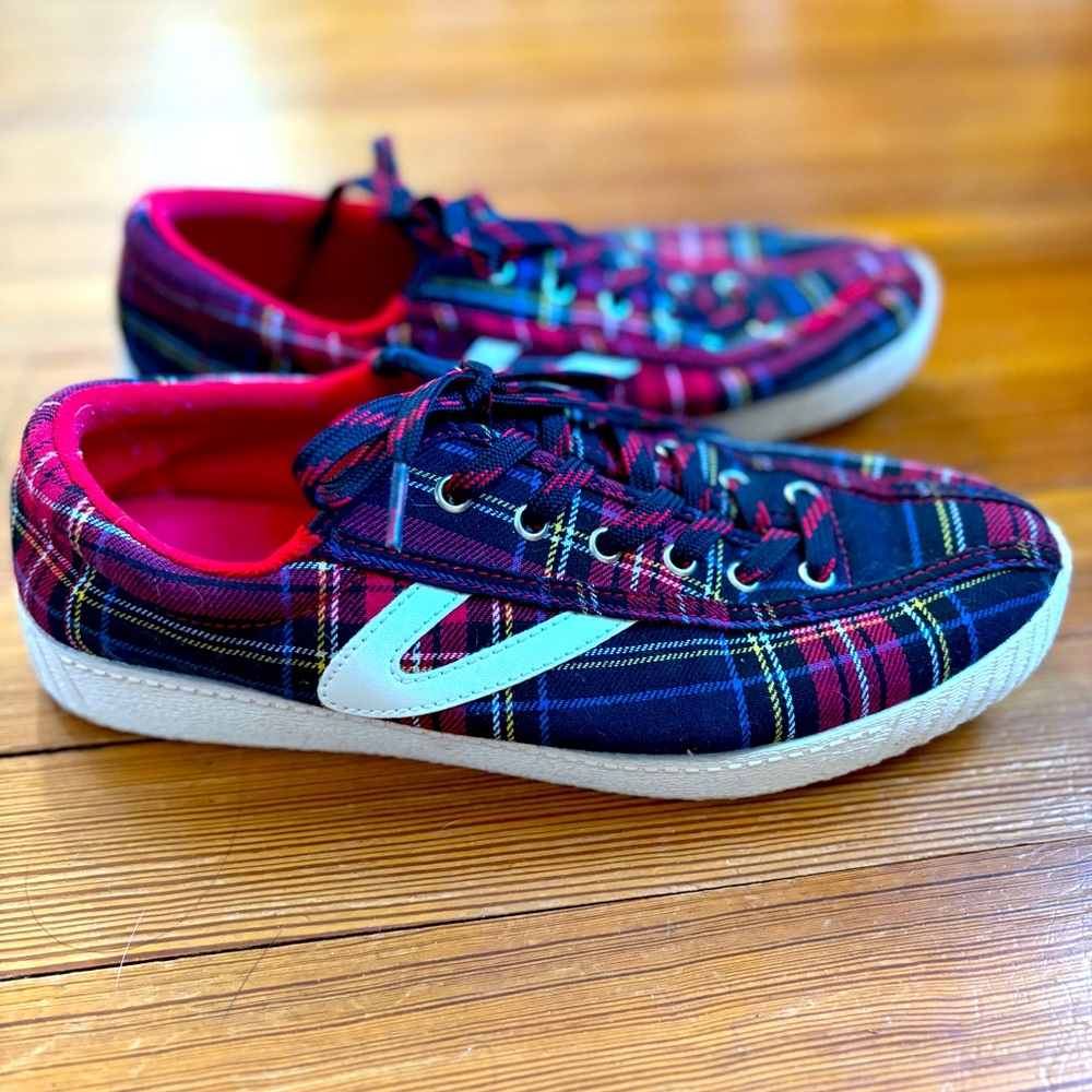Adorable tartan Tretorn sneakers size 8.5. Worn only once! Great condition.